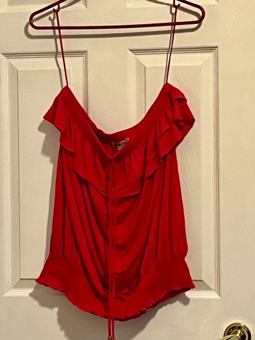Bright pink strapless top with ruffle and front tie